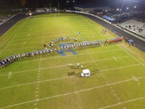 Teams meet on field after LCHS win over Elkins Oct. 23
