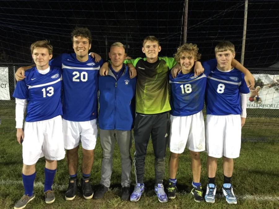 Seniors take one last photo following the Sectional Championship at Buckhannon.