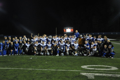 The football team and cheerleaders after the game at Buckhannon-Upshur. 