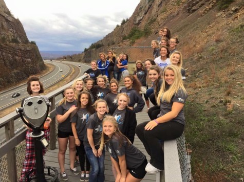 Lewis Cheerleaders head to Regional Championships Nov. 6. They are pictured at "The Cut" enroute to Hedgesville High School. 